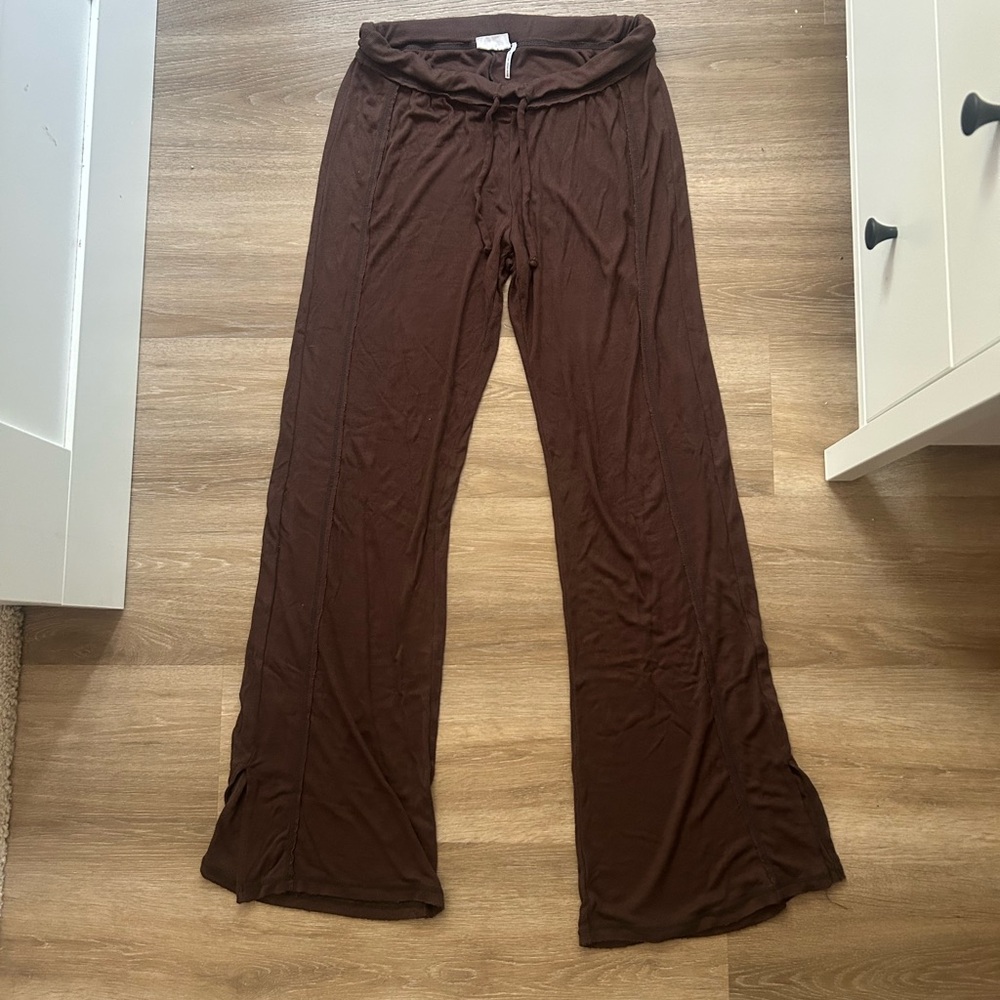 Out from under flared loose pants